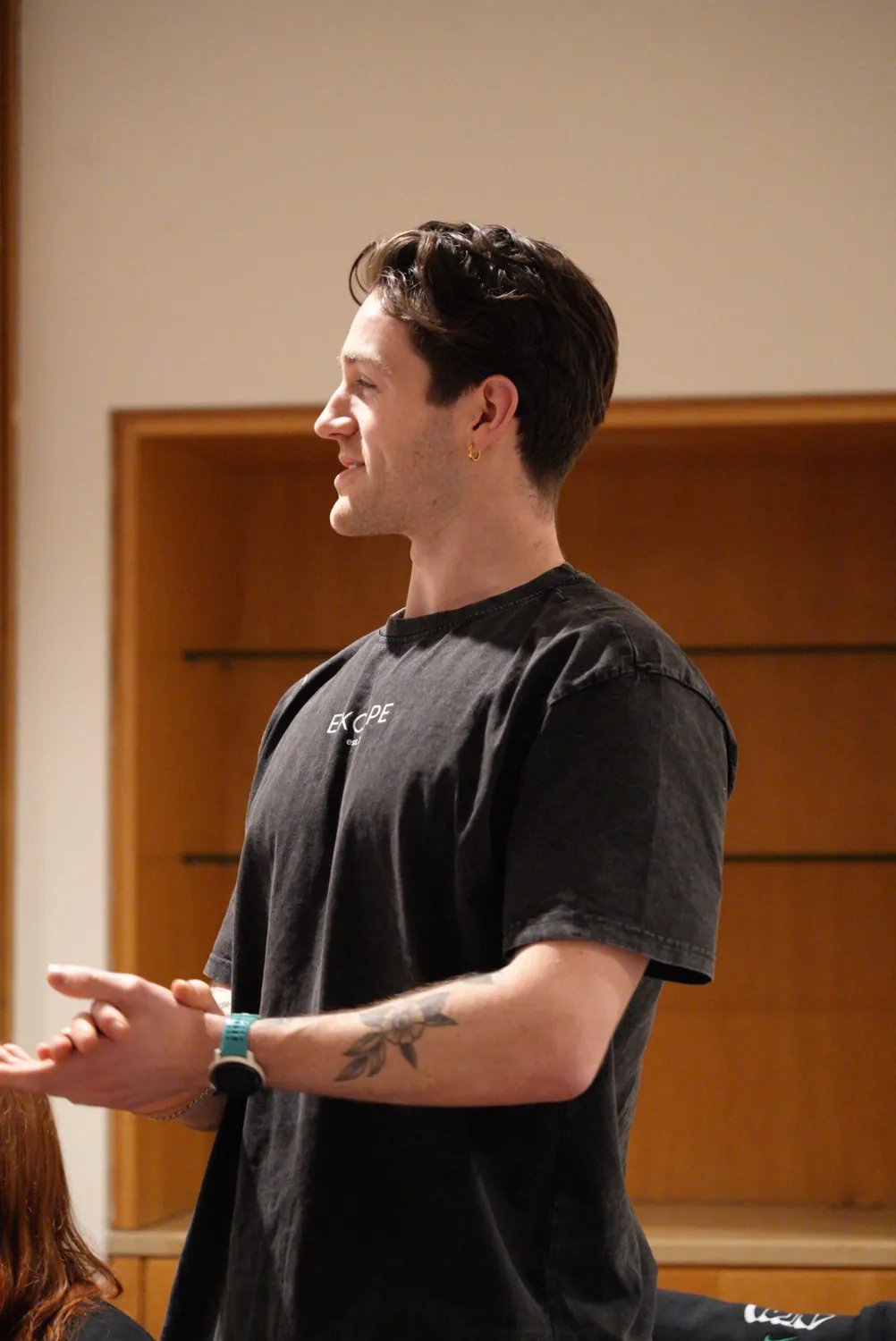 An Excape coach speaking at the team conference day