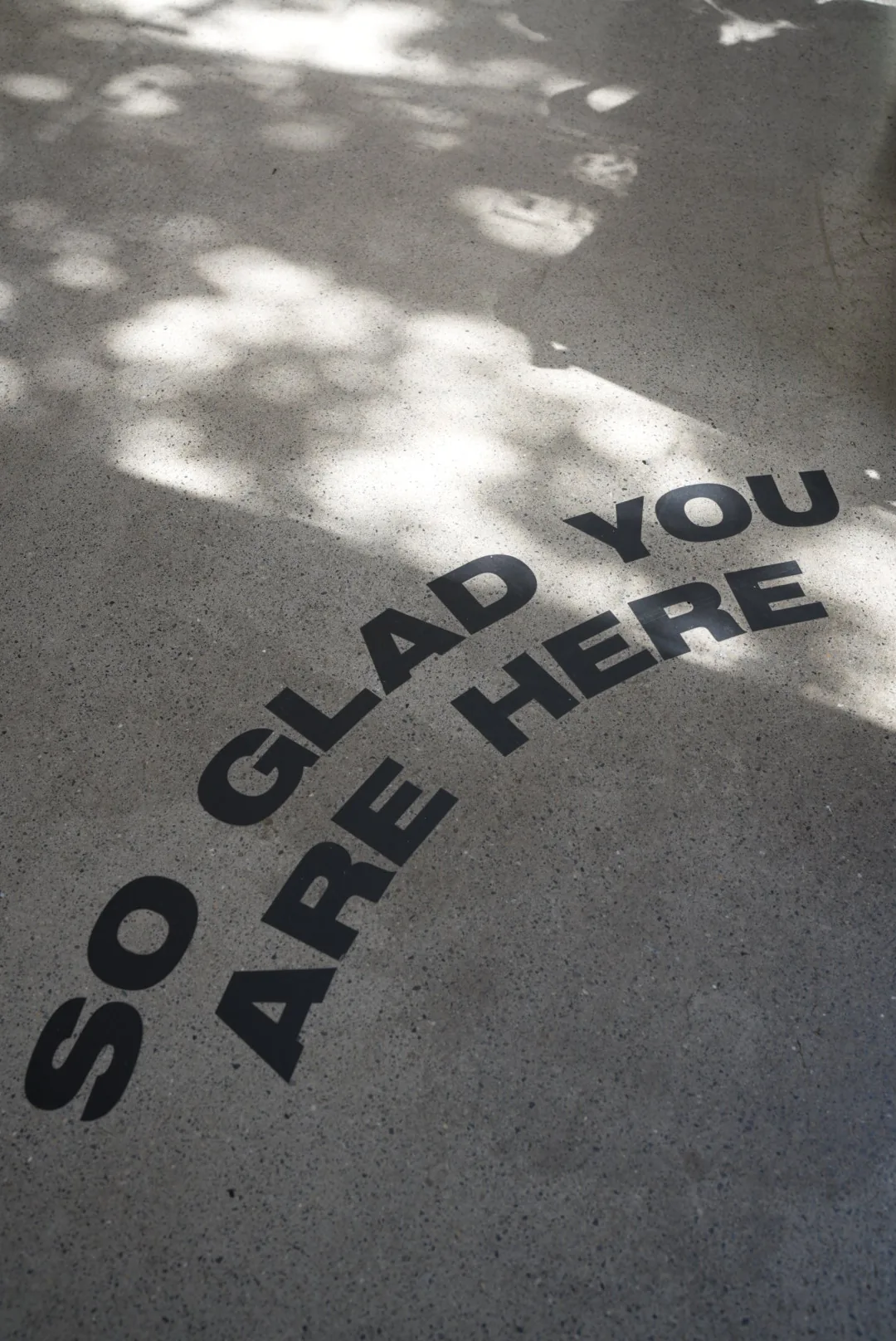 So glad you are here, painted at the studio entrance